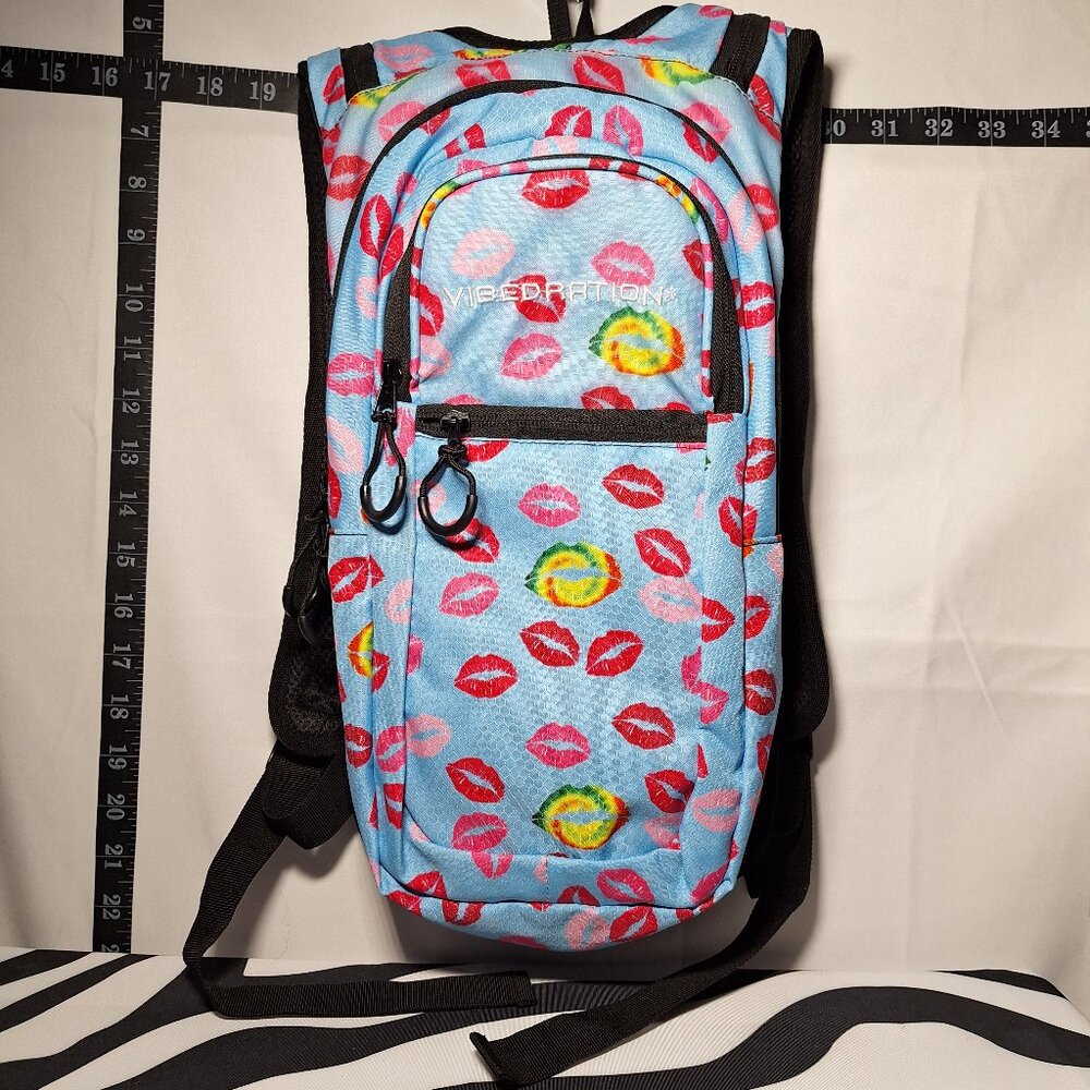 NWOT Vibedration Hydration Backpack w/bladder- blue w/red+ kisses